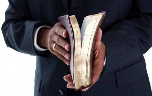 Angry mob beats up preacher after a pack of condoms fell from his Bible