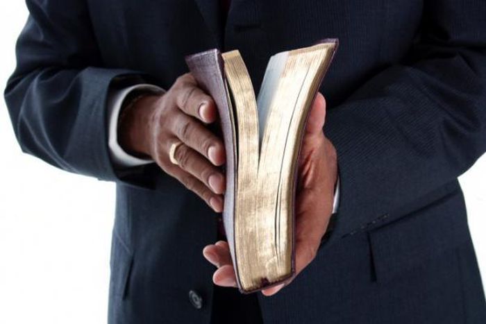 Angry mob beats up preacher after a pack of condoms fell from his Bible