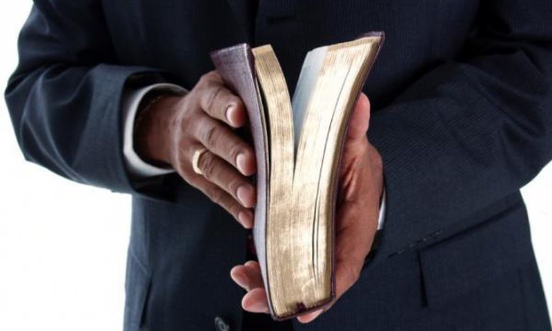 Angry mob beats up preacher after a pack of condoms fell from his Bible