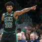 Boston Celtics Marcus Smart urged young people to take the health threat seriously