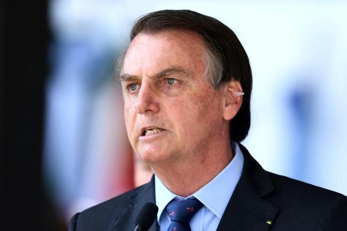 Brazilian President Jair Bolsonaro, seen at a military celebration in Brasilia on December 13, 2019, has said it was wrong to say a journalist had 'the face of a homosexual'