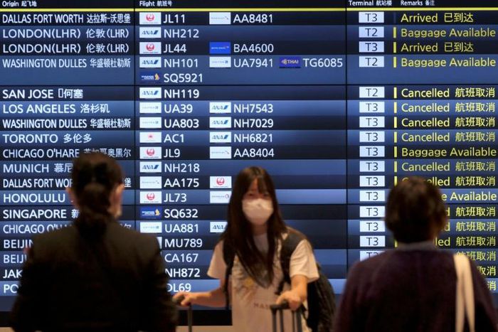 Japan has tightened travel advice for its citizens in a bid to halt the spread of the coronavirus