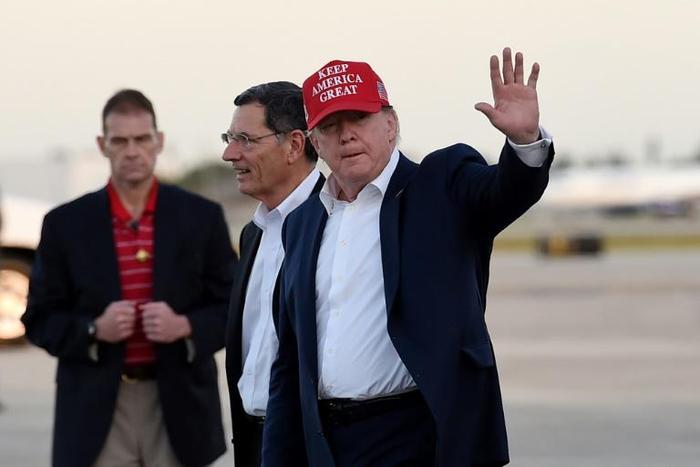 US President Donald Trump steps off Air Force One upon arrival in West Palm Beach, Florida, in November 2019