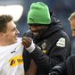 Moenchengladbach forwards Marcus Thuram (R) and  Patrick Herrmann (L) celebrate after their 3-1 win over Werder Bremen in their last Bundesliga game nearly two weeks ago.