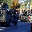 Mexican soldiers with an armoured car patrol the streets during a 2014 operation against the Jalisco Next Generation narcotics cartel