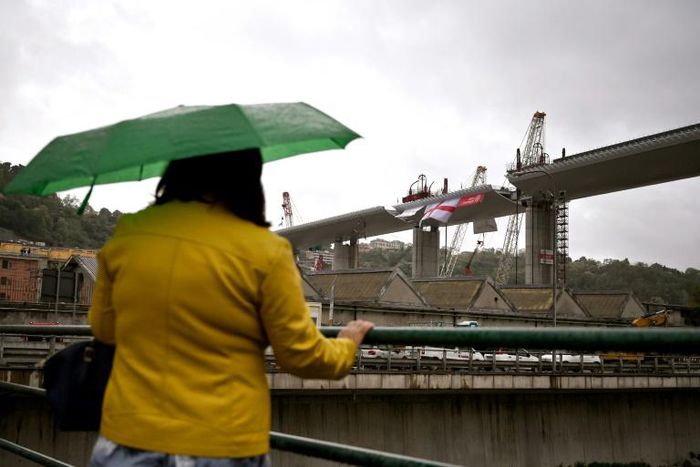 Construction of the gleaming structure in northern Italy's coastal Liguria region has continued night and day throughout a national lockdown