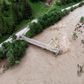 A collapsed bridge in western Ukraine after heavy flooding