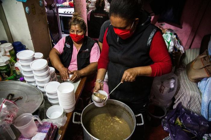 Lidia Portales, center, is helping feed sex workers deprived of their livelihoods by Peru's lockdown imposed over the coronavirus pandemic