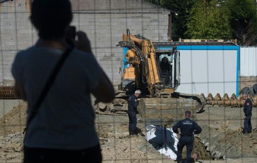 Some 2,300 residents were evacuated as the experts dug a hole around the bomb before cutting it up and taking it away to be destroyed