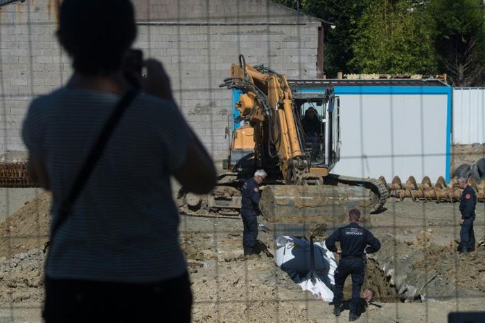 Some 2,300 residents were evacuated as the experts dug a hole around the bomb before cutting it up and taking it away to be destroyed