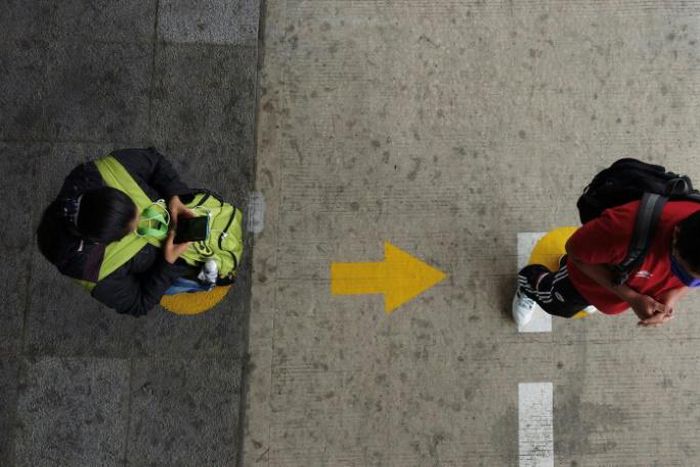 People respecting social distancing measures in Ecuador's capital Quito