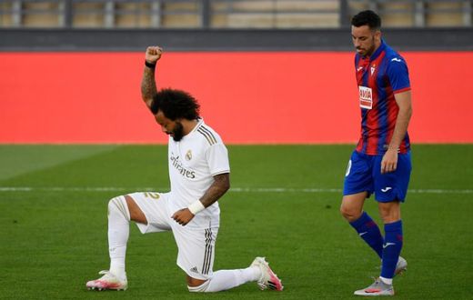 Real Madrid's Brazilian defender Marcelo knelt on the field to celebrate his goal against Eibar on Sunday.