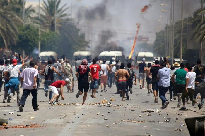 Tunisian protesters clash with security forces as they demonstrate in the southern city of Tataouine demanding authorities make good on a 2017 promise to provide jobs in the gas and oil sector