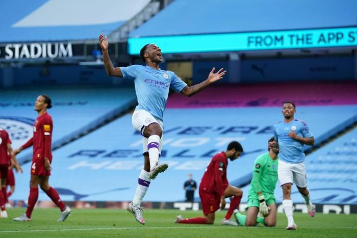 Raheem Sterling celebrates Manchester City's second goal against Liverpool
