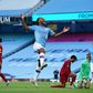Raheem Sterling celebrates Manchester City's second goal against Liverpool
