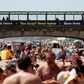 Britons revelled in soaring temperatures by flocking to beaches and parks ahead of a further easing of lockdown measures