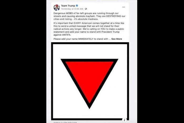 This computer screen capture shows a removed Trump campaign ad that appeared in feeds on Facebook on June 18, 2020 and contained a symbol used in Nazi Germany for political prisoners