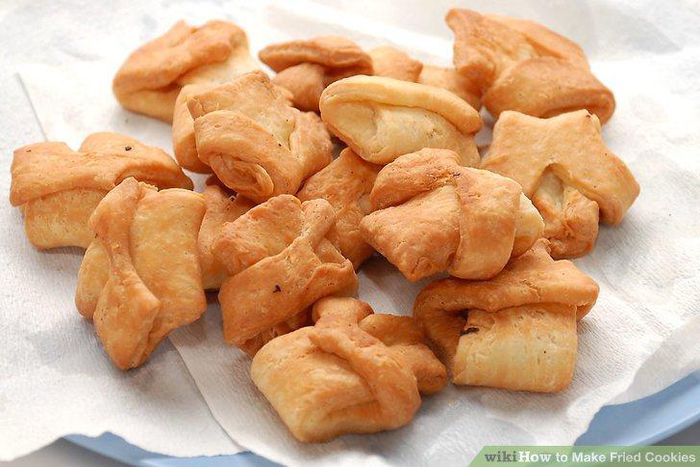 Street Hustle Accra: A day in the life of a widow frying cookies to cater for family