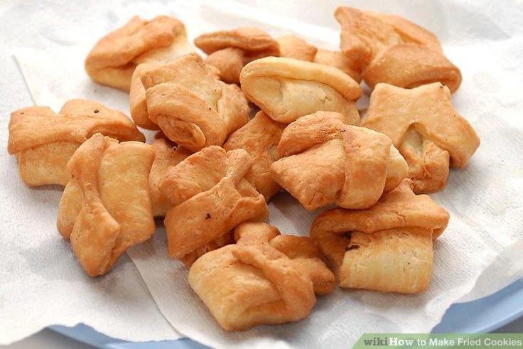 Street Hustle Accra: A day in the life of a widow frying cookies to cater for family