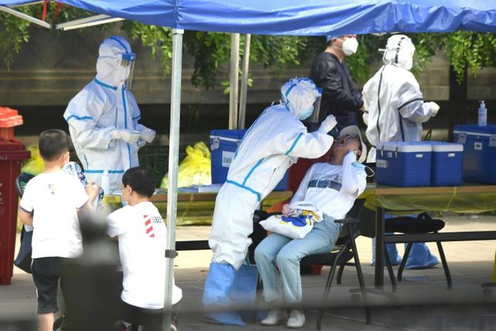 Chinese authorities are testing thousands of people as a new cluster of coronavirus cases sparked alarm