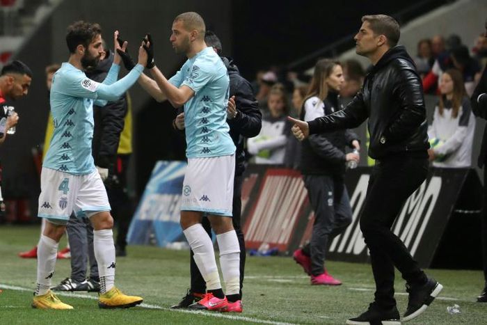 Time for a change: Cesc Fabregas is replaced by Islam Slimani in a Monaco league game