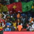 Midfielder Christian Bassogog (L) and assistant coach Sven Vandenbroeck celebrate after Cameroon won the 2017 Africa Cup of Nations final against Egypt in Libreville