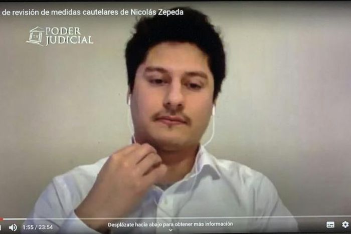 An image grab shows Nicolas Zepeda attending a virtual court on his extradition case in Santiago, on May 27, 2020