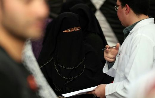 A doctor gives medical advice about female genital mutilation to a woman in Egypt, where the practice is already banned