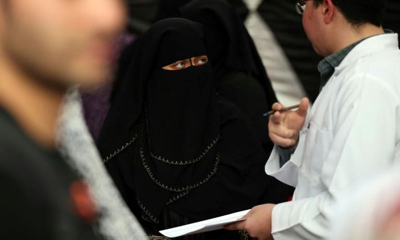 A doctor gives medical advice about female genital mutilation to a woman in Egypt, where the practice is already banned