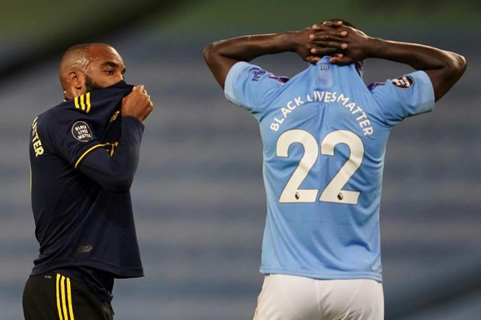 Manchester City defender Benjamin Mendy (right) says football can make a difference in the fight against racism