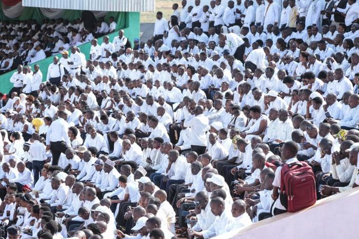 The stadium in Gitega where the funeral ceremony is to be held was packed with citizens from across the country, all dressed in white at the request of authorities