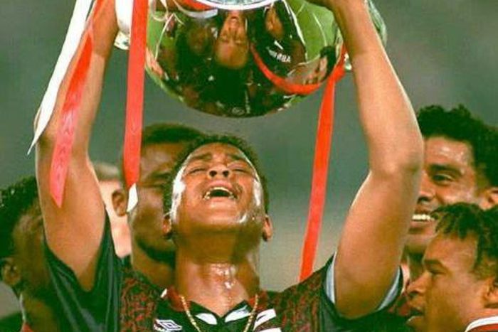 (FILES) Patrick Kluivert lifts the trophy after scoring the winner for Ajax against AC Milan in the 1995 Champions League final