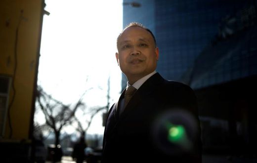 Yu Wensheng poses for a portrait in Beijing in 2017. His wife said the human rights lawyer had been sentenced to four years in jail for "inciting the subversion of state power"