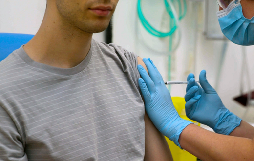 In this screen grab from video issued by Britain's Oxford University, a volunteer is injected with either an experimental COVID-19 vaccine or a comparison shot as part of the first human trials in the U.K. to test a potential vaccine, led by Oxford Uni...