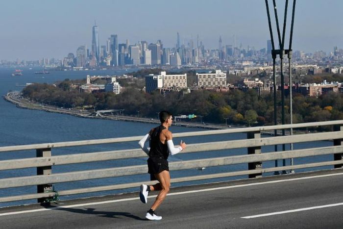 A runner participates in the November 2019 New York Marathon, whose 2020 edition has been canceled