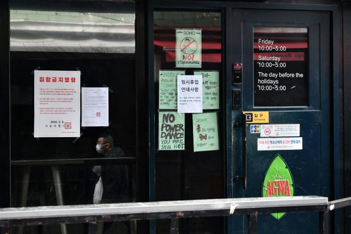 A spike of new cases, driven by a cluster in venues in Seoul's Itaewon district -- including several gay clubs -- forced authorities to delay this week's planned re-opening of schools