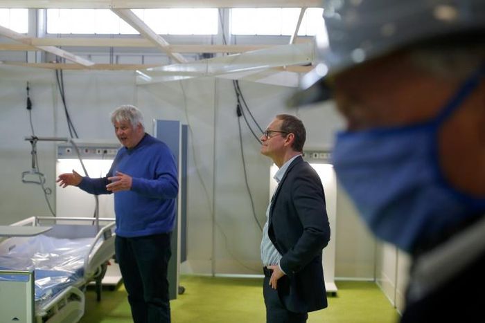 Wires are still hanging from the ceilings, but  the vast Berlin site will soon be able to host up to 1,000 patients