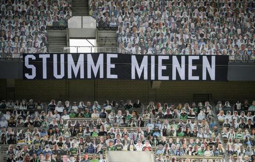 A banner reading "Silent Faces", surrounded by cardboard cut-out of Borussia Moenchengladbach fans, during Saturday's 3-1 home defeat to Leverkusen.