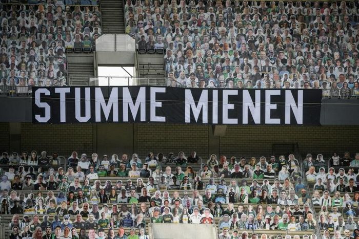 A banner reading "Silent Faces", surrounded by cardboard cut-out of Borussia Moenchengladbach fans, during Saturday's 3-1 home defeat to Leverkusen.