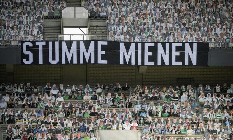 A banner reading "Silent Faces", surrounded by cardboard cut-out of Borussia Moenchengladbach fans, during Saturday's 3-1 home defeat to Leverkusen.