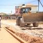 Asamoah Gyan  develops deplorable roads at Weija