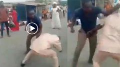 Two grown ‘gentlemen’ fight in the middle of the street over woman (video)