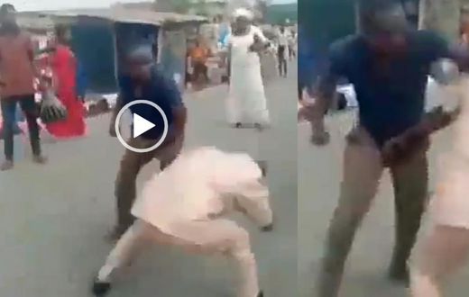 Two grown ‘gentlemen’ fight in the middle of the street over woman (video)