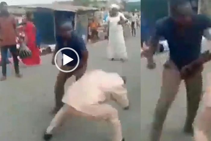 Two grown ‘gentlemen’ fight in the middle of the street over woman (video)