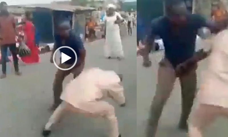 Two grown ‘gentlemen’ fight in the middle of the street over woman (video)