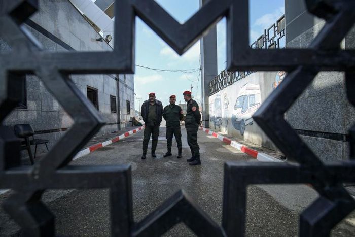 Palestinian security forces loyal to Hamas stand at the Rafah border crossing with Egypt in the southern Gaza Strip