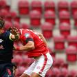 Leipzig's Danish forward Yussuf Poulsen (L) scored and set up two more goals against Mainz on Sunday despite suffering torn ankle ligaments.