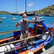 British solo rower Graham Walters, 72 arrives in Antigua on April 29, 2020 after nine weeks of rowing across the Atlantic