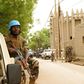 A UN peacekeeper patrols outside the mosque in Mopti, central Mali -- UN Secretary General Antonio Guterres has called for the force's mandate to be renewed for another year, without any cuts to personnel
