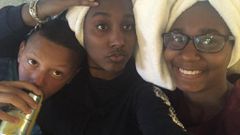 Paige with two of her cousins after going swimming.